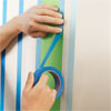 apply a second round of tape for painting a striped wall