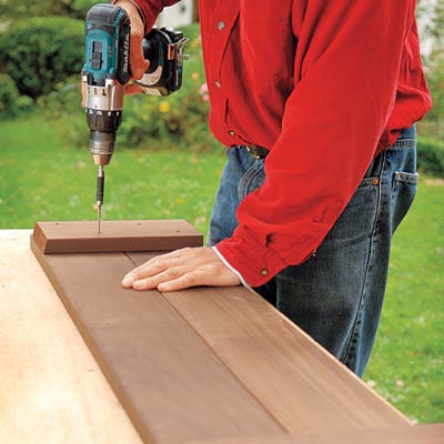 screwing in the back battens with a drill/driver