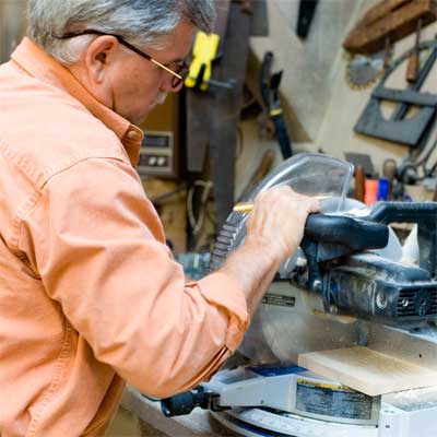 this old house general contractor cutting the ledges to size for building a freestanding lamp