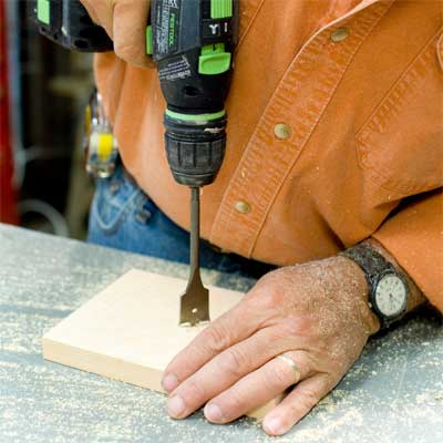 this old house general contractor drilling recesses for the spacers while building a freestanding lamp