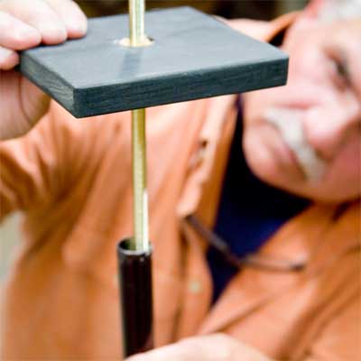 this old house general contractor assembling the pieces to build a freestanding lamp