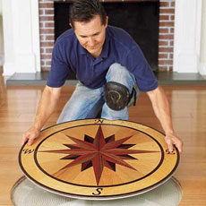man installing a floor medallion