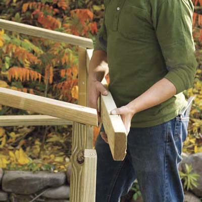 Mark Powers installing front crosspiece for his trash shed