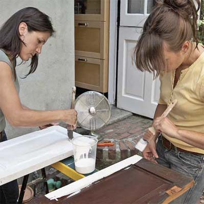 priming and painting the shutters and allowing them to dry