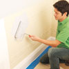 applying primer to the installed Lincrusta wainscot panels
