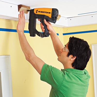 attaching backing blocks for the upper crown molding for three-piece crown molding