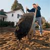 toh landscape contractor roger cook spreading compost
