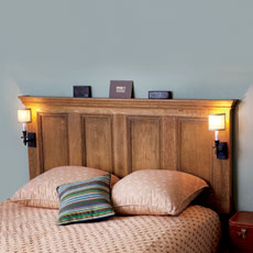 an interior door made into a headboard
