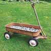 line the wagon with gravel to make a herb planter on wheels