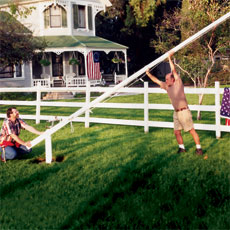 t o h master carpenter norm abram raising an in-ground flagpole