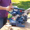 Mark Powers cuts pieces for a hypertufa table with a miter saw