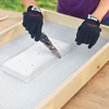Mark Powers cuts wire mesh for the recessed area of a hypertufa table