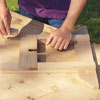 Mark Powers dry-fits the pieces of the hypertufa table together