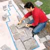 fit the stones to clad concrete steps in stone