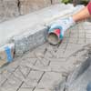 add a slurry mix to clad concrete steps in stone