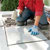 add the interior pavers to clad concrete steps in stone