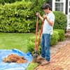 digging the postholes to build a garden gate