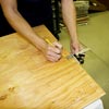marking off the area where the trim is applied with a combination square