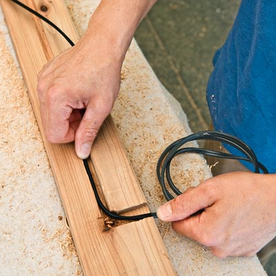 placing cable in the wiring channel