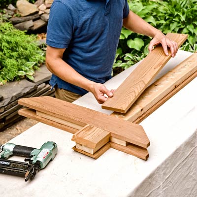 attaching the 1x6 pieces to the 2x4 center board