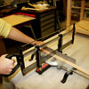cutting molding using a hand miter saw with a stop block