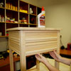 attaching the trim to the side table apron