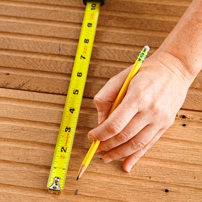 measuring tongue-in-groove flooring to use as recessed shelving