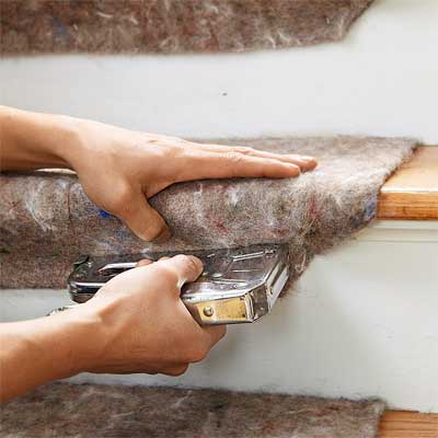 Staple the Padding to the Steps to Install a Flat-Weave Cotton Stair Runner