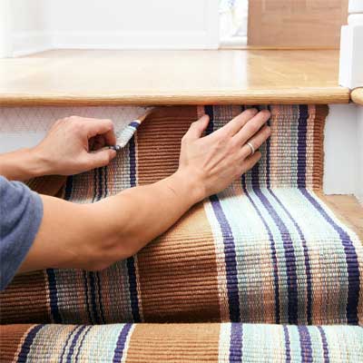 Tape the Runner to the Top Riser to Install a Flat-Weave Cotton Stair Runner