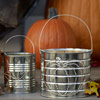 how to make tin can luminaries adding tea light