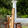 a coat rack made from a salvaged antique column