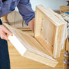 gluing the boxes together to secure the base