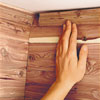 Attach the molding to the topmost course along the line of closet ceiling