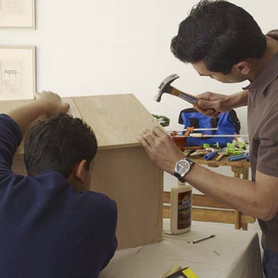 build the roof by glueing and nailing the front and back