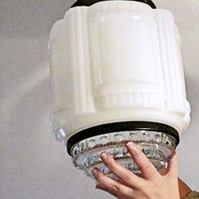 secure the glass shade of the vintage fixture