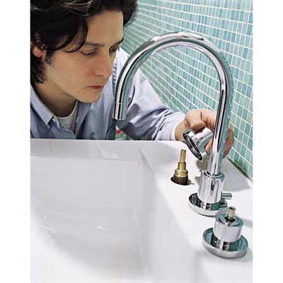 Installing the hot and cold valves.