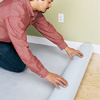 Unrolling foam underlay