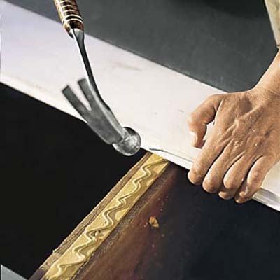 using adhesive to attach new decking