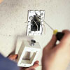 Attaching the extension box of a floodlight 