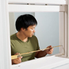 Measuring the window opening.