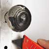 cut paint on door hardware with utility knife
