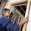 Tom Silva attaching the split jamb of a prehung door