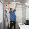Completing the enclosure of a shower door 