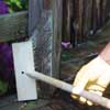 scrub the wood deck with cleaning solution