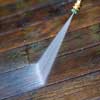 rinse off the cleaning solution with the pressure washer
