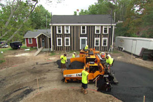 Working on the driveway of the Bedford house in episode 3108 of This Old House