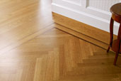 a newly installed herringbone floor