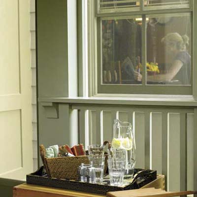 Square baluster railing provides a buffer between the screen panels and kids and dogs that might rub up against it